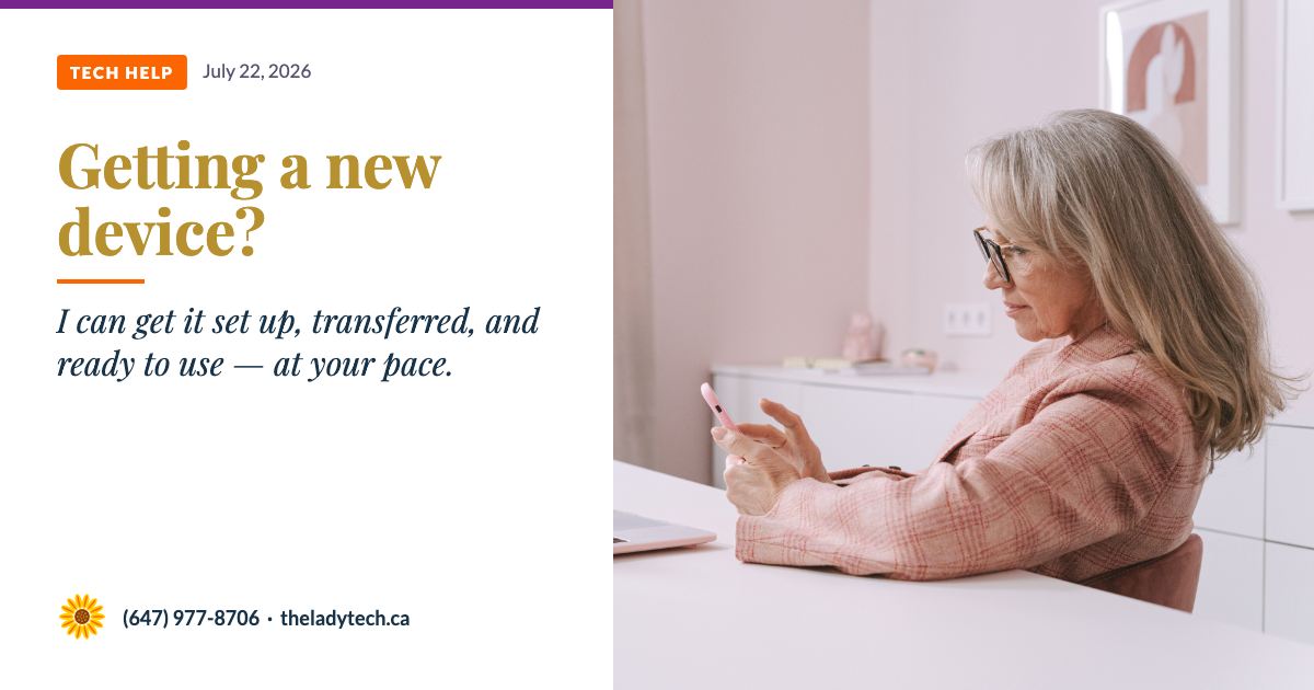 A middle-aged woman with blonde hair and glasses sitting at a desk with a laptop, holding a phone and looking at the screen, with text reading: Getting a new device? — I can get it set up, transferred, and ready to use — at your pace.